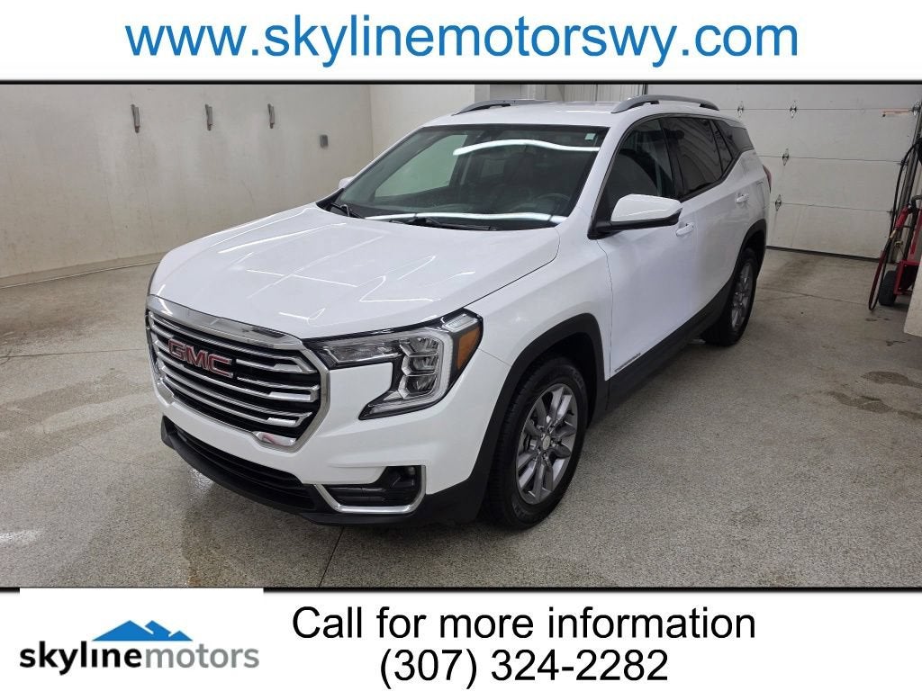 2024 GMC Terrain SLT in Summit White — front three-quarter view